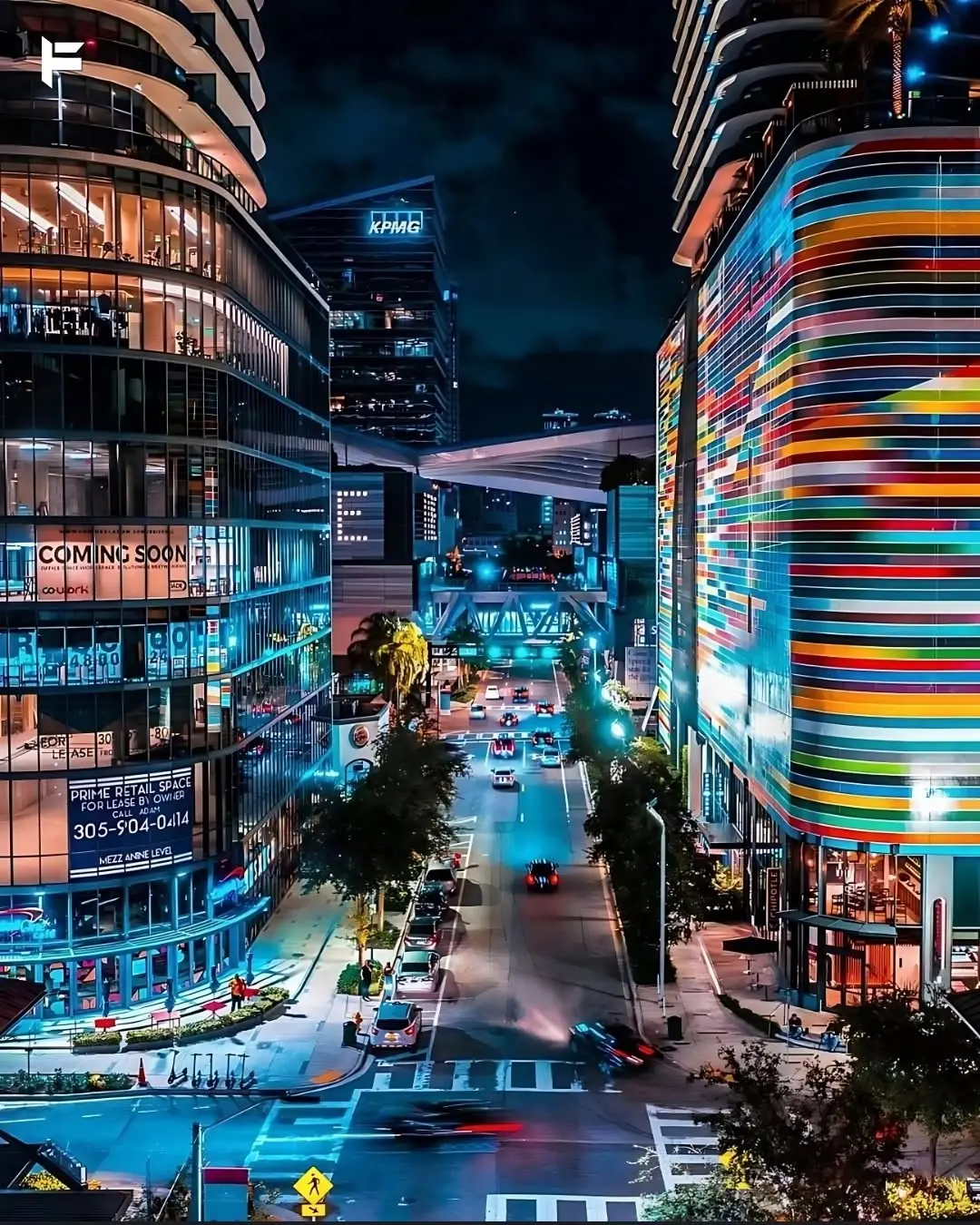 Brickell Miami at night — colorful skyline with luxury high-rises